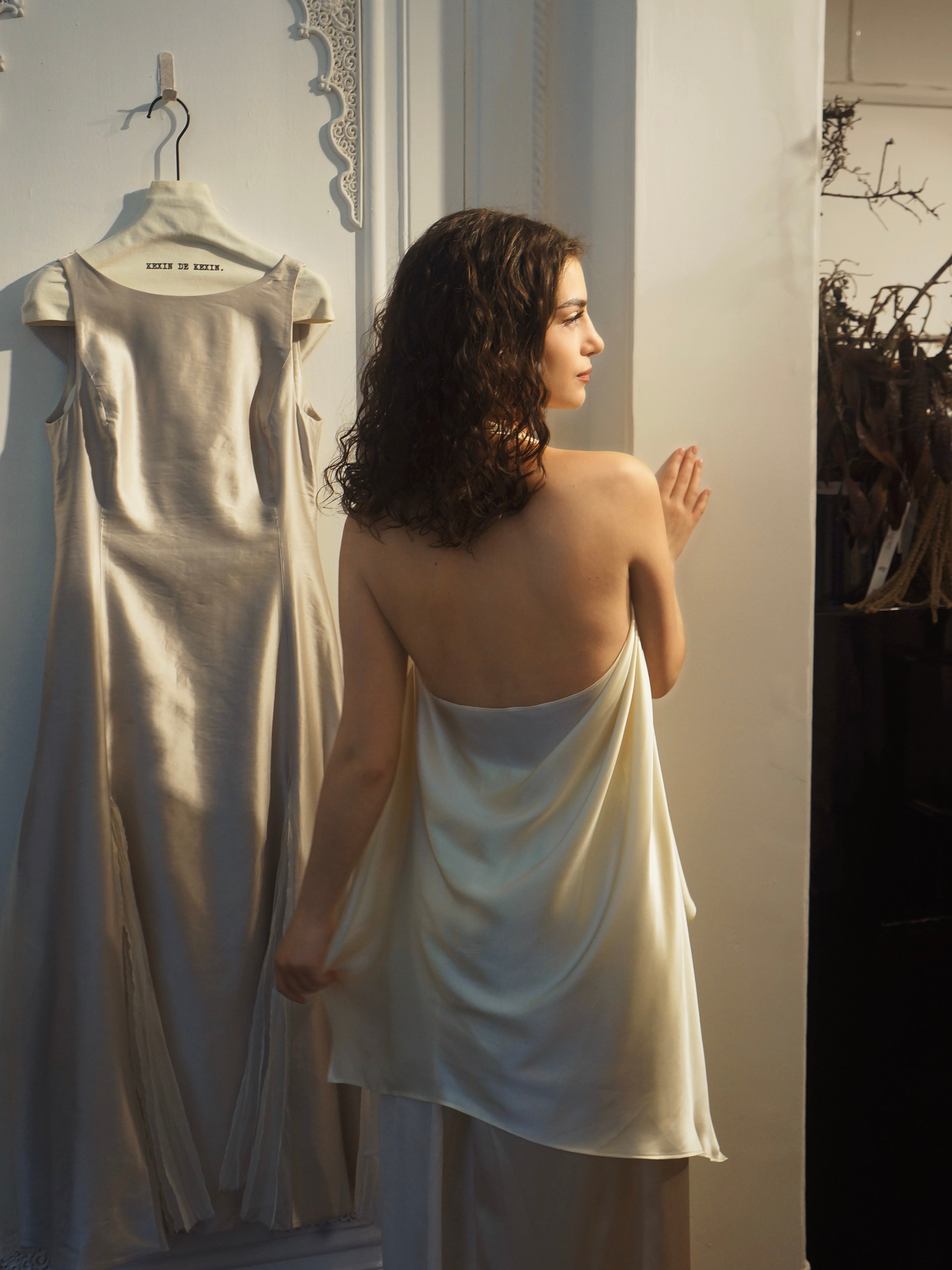 Sculptural draped halter top