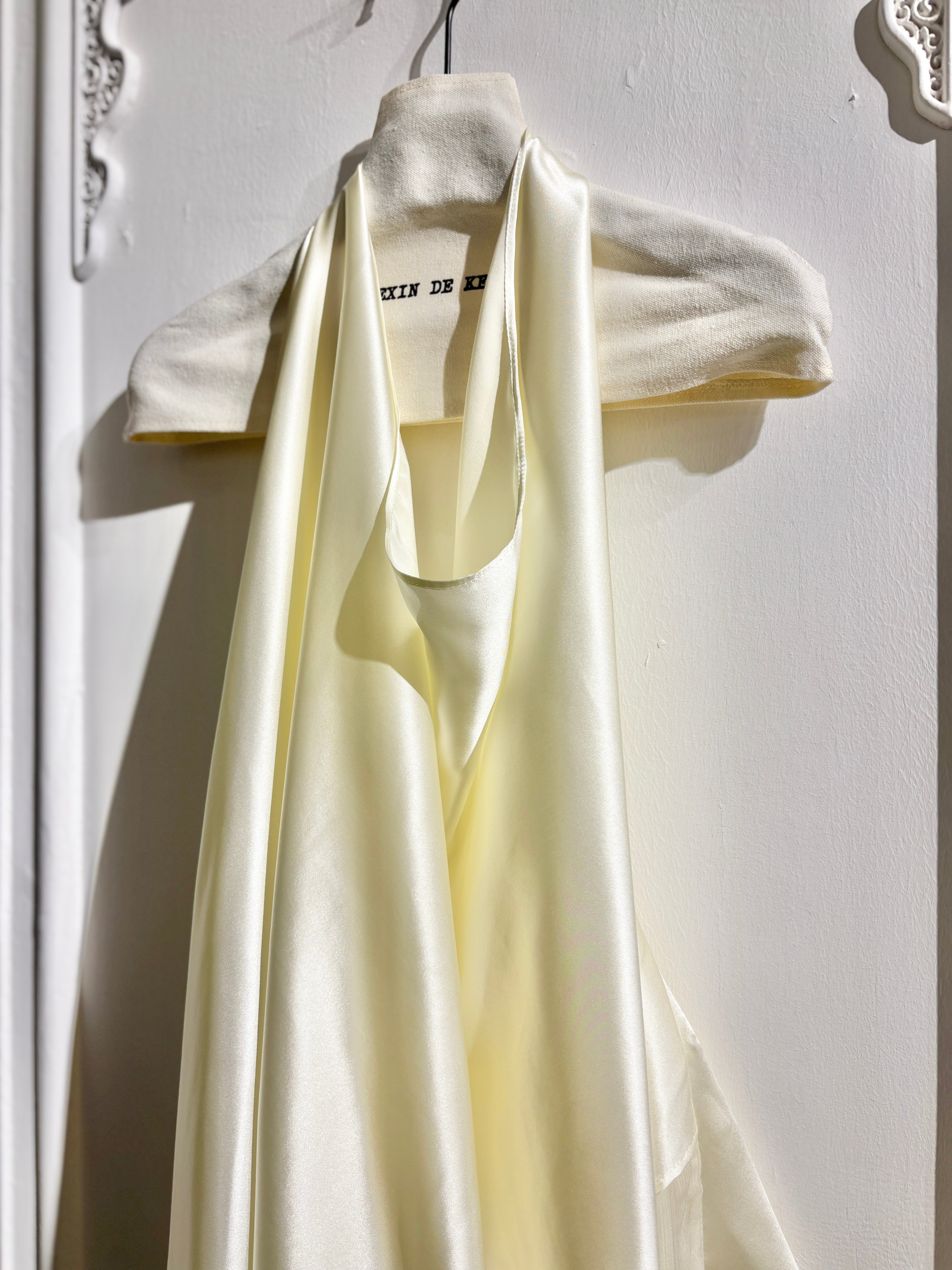 Sculptural draped halter top