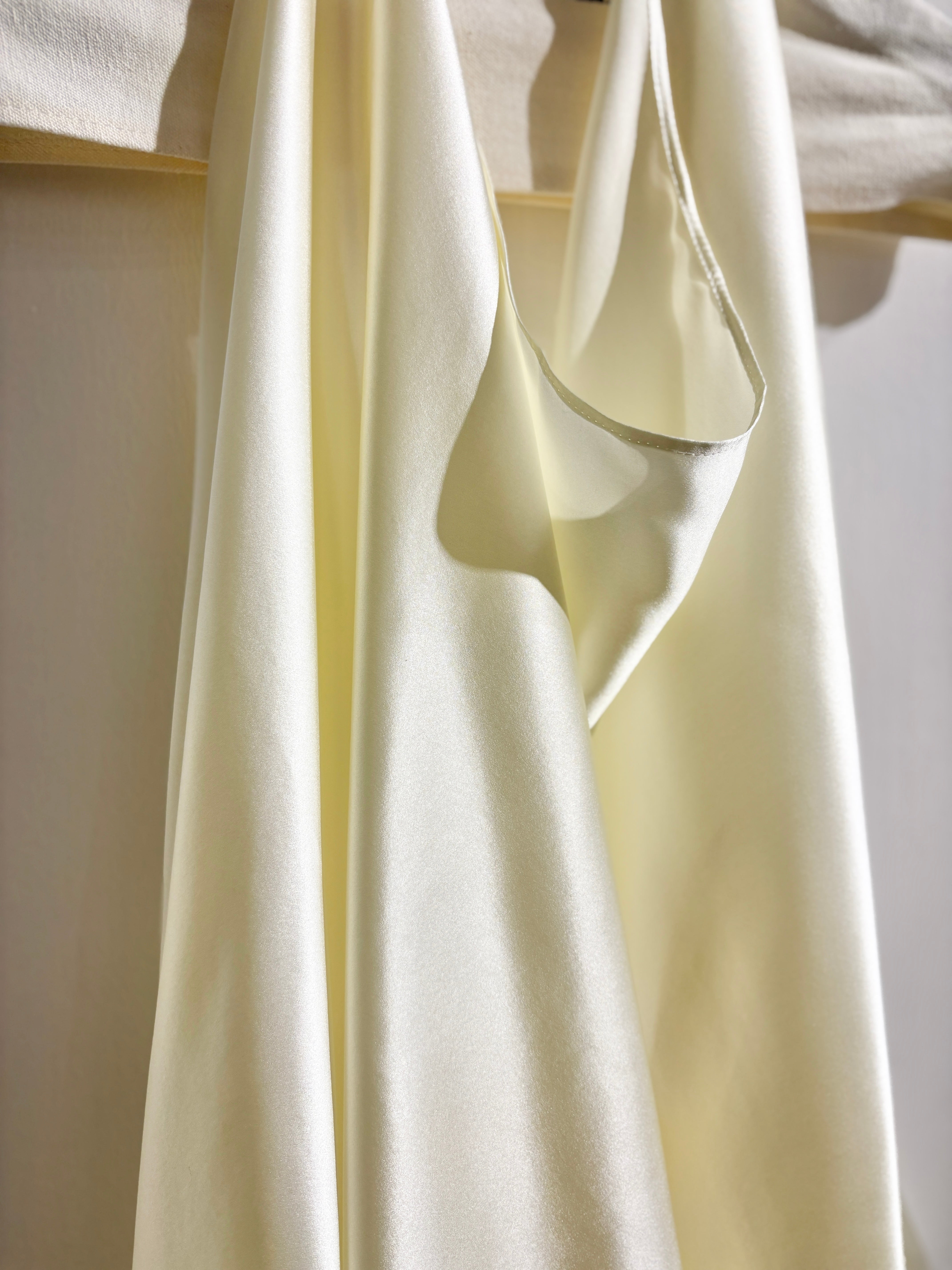 Sculptural draped halter top