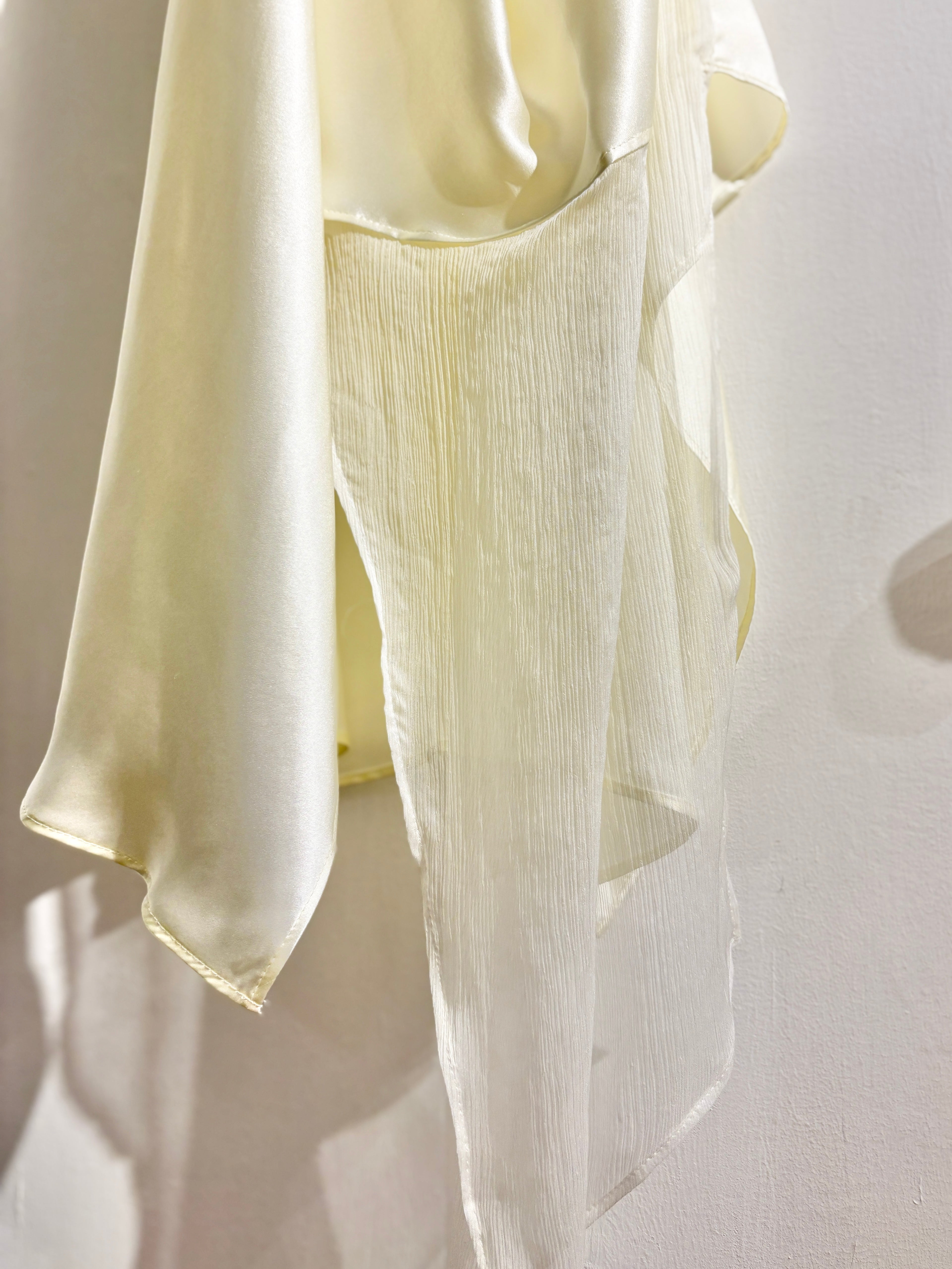 Sculptural draped halter top