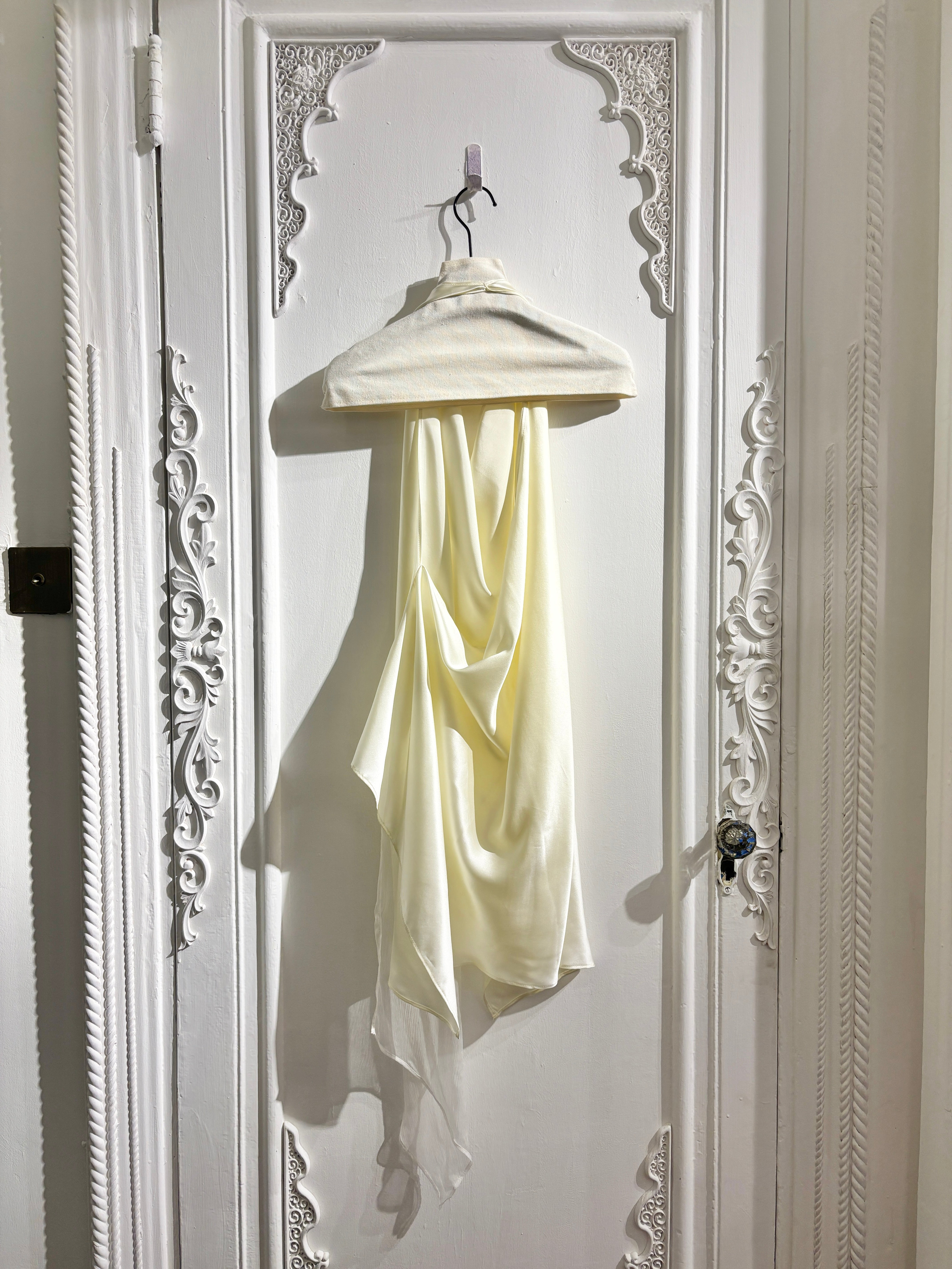 Sculptural draped halter top