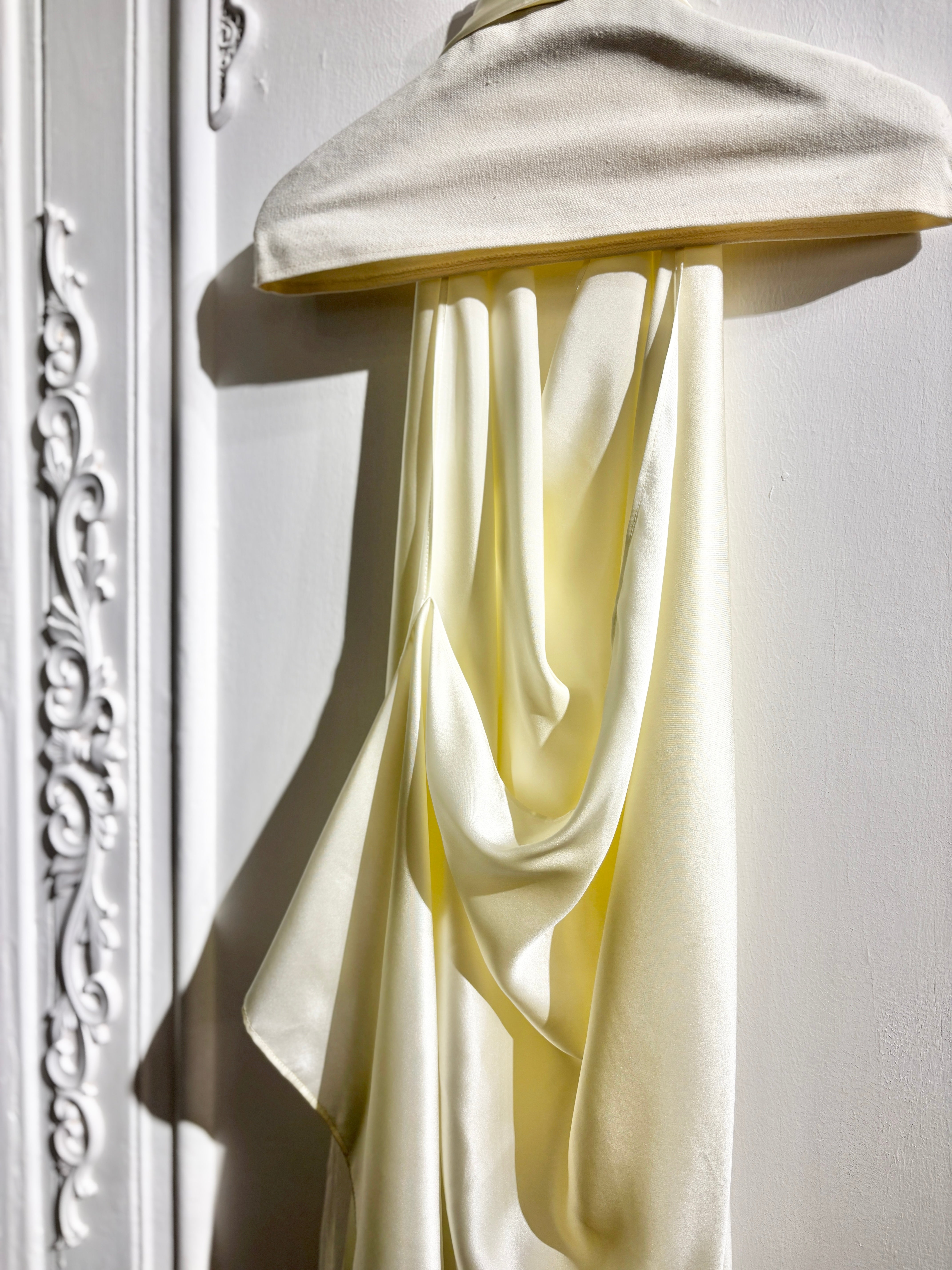 Sculptural draped halter top